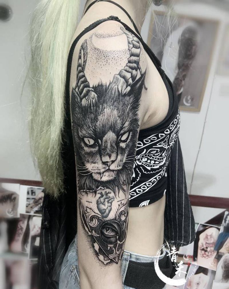 猫纹身图片_手臂欧美写实点刺纹身图案