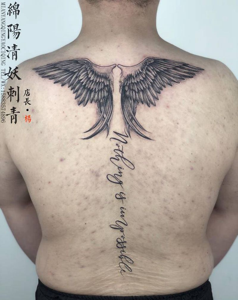 后背翅膀纹身图片_胸部肩部纹身图案