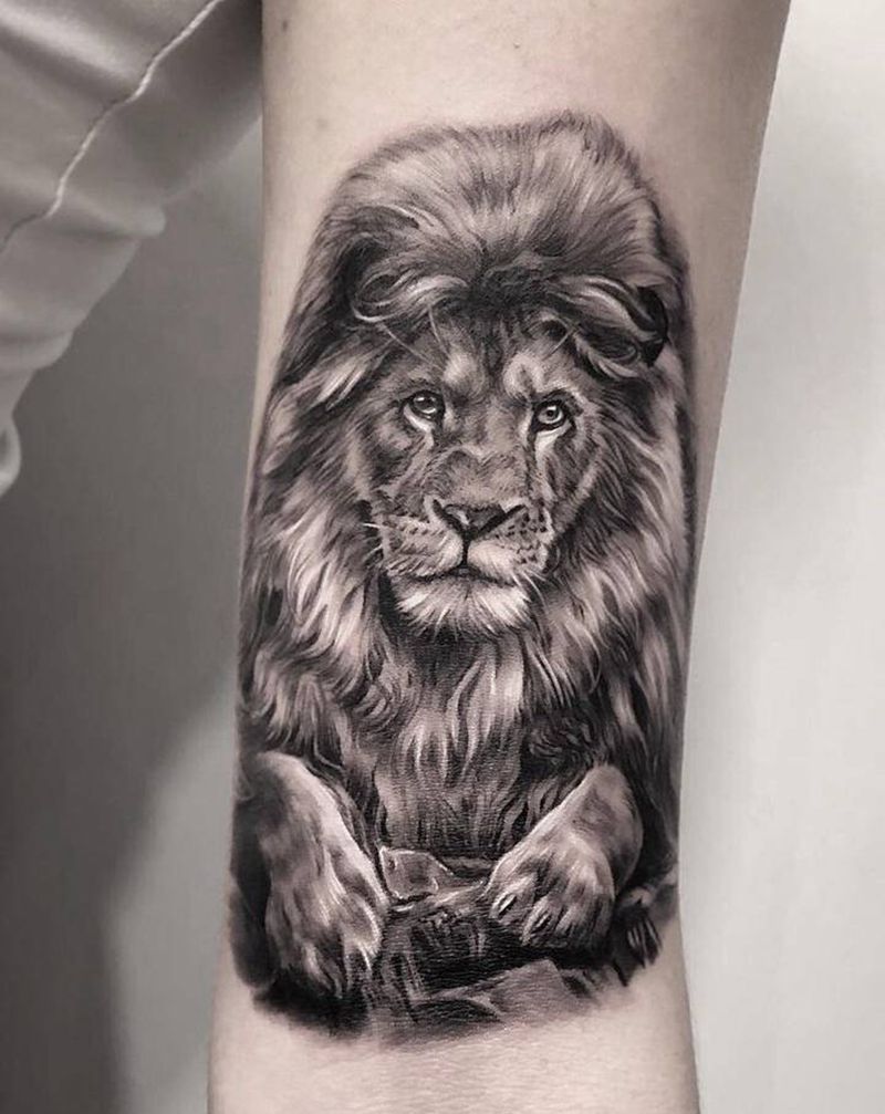 新年第一头狮子纹身图片_手臂纹身图案