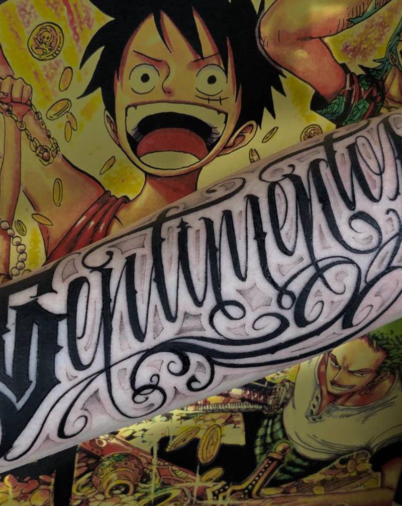 花体字纹身图片_手臂花体字纹身图案