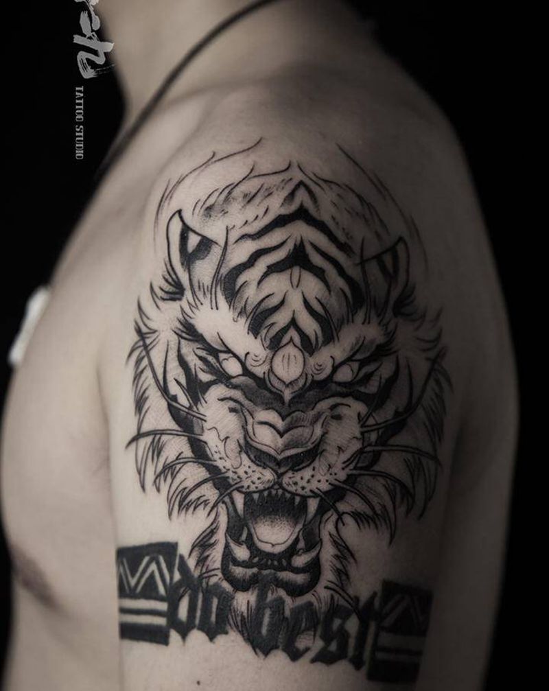 虎头纹身图片_手臂新传统纹身图案