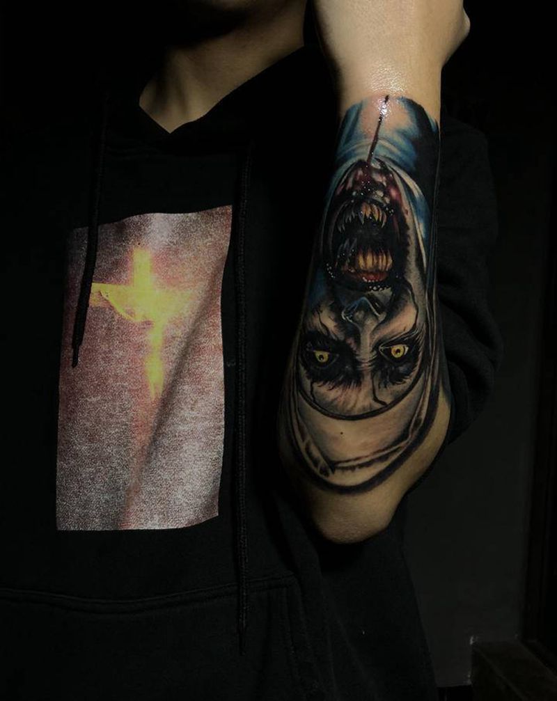 修女纹身图片_手臂纹身图案