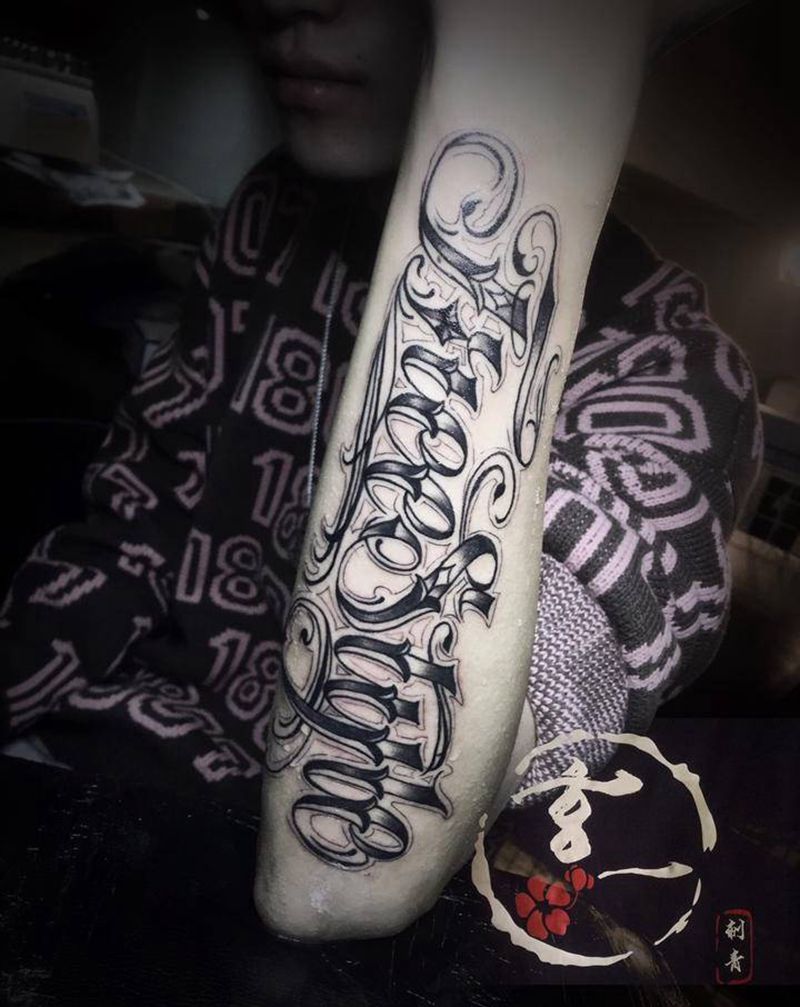 花体纹身图片_手臂纹身图案