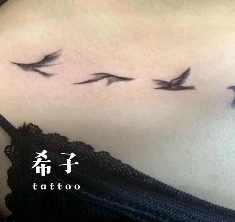 大雁南飞纹身图片_肩部纹身图案