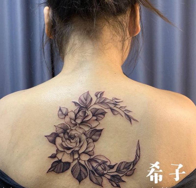 素花 未完待续.....纹身图片_背部纹身图案