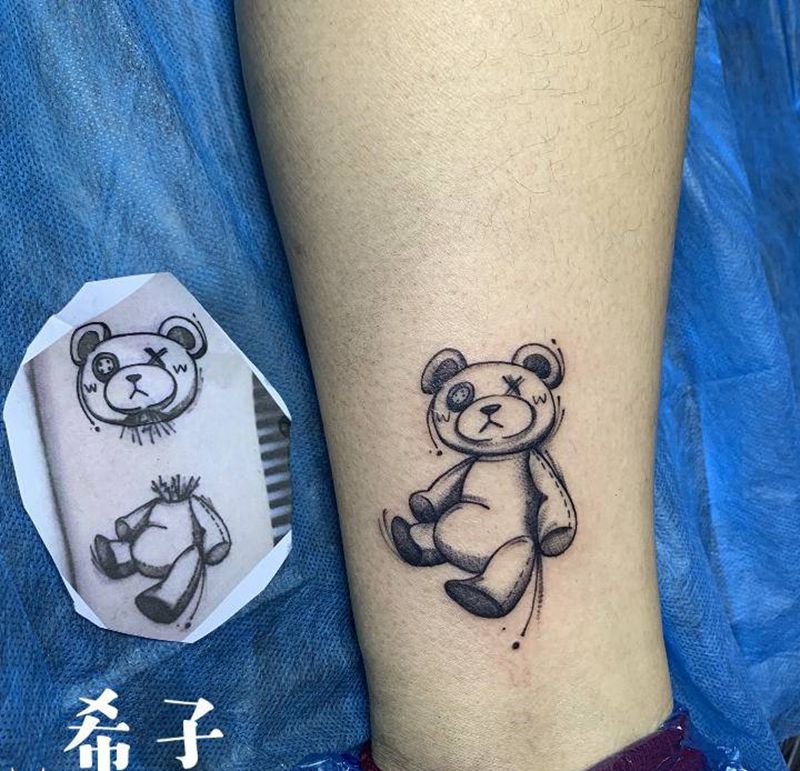 暗黑布偶纹身图片_腿部纹身图案