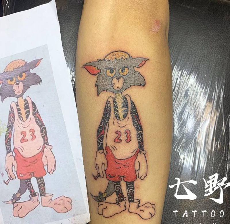 老传统通体汤姆猫纹身图片_手臂纹身图案