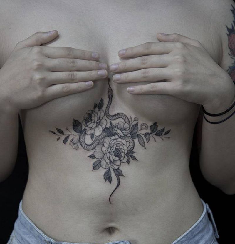 素花纹身图片_胸部点刺纹身图案