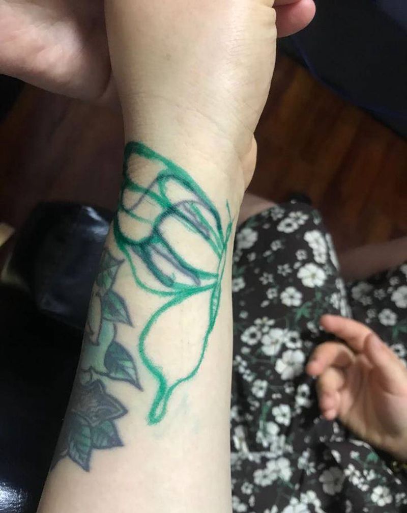 遮盖一枚纹身图片_手臂纹身图案