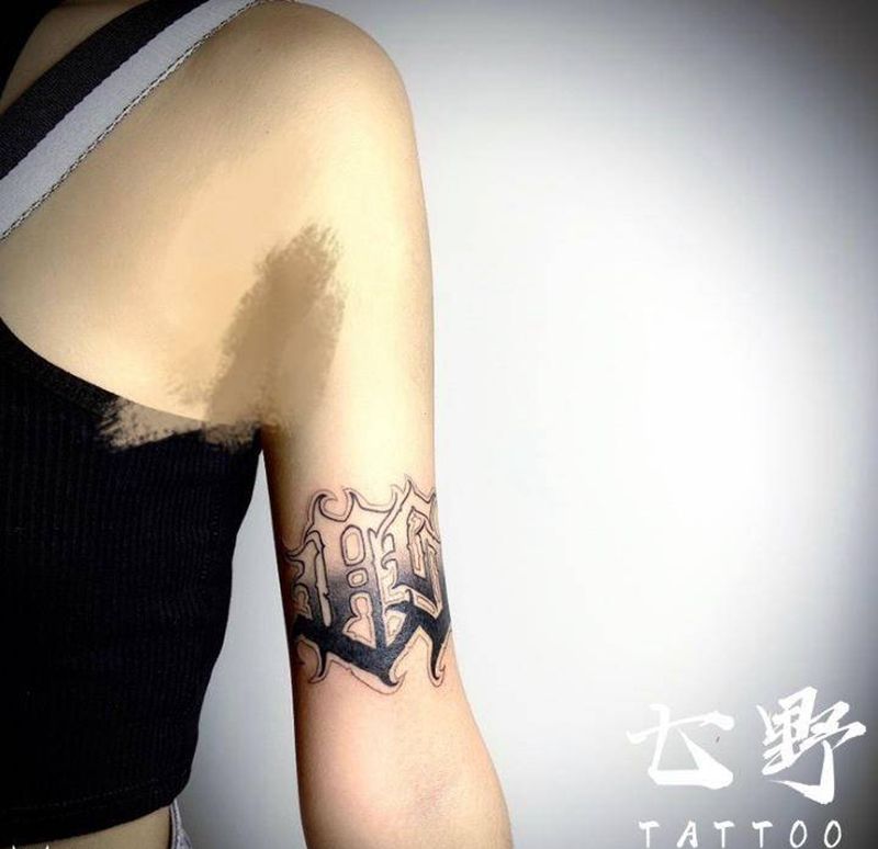 个性花体纹身图片_手臂花体字纹身图案