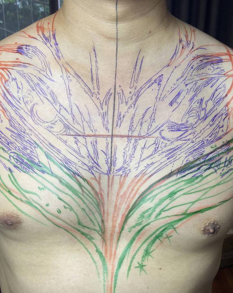 设计暗黑花胸一枚纹身图片_胸部花体字纹身图案