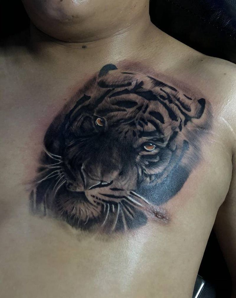 遮盖纹身图片_胸部纹身图案