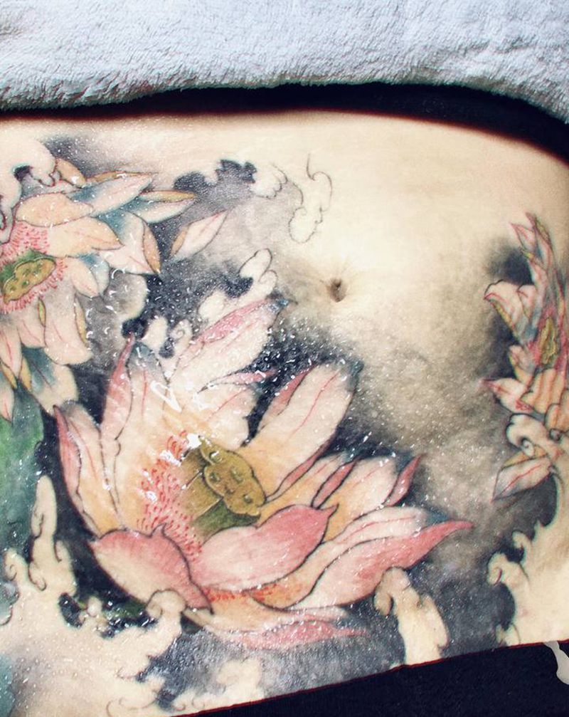 妊辰纹遮盖纹身图片_腹部纹身图案