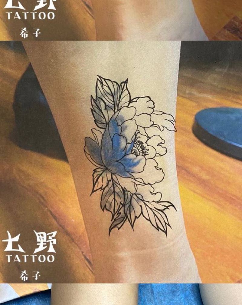 遮盖又一个纹身图片_腿部纹身图案
