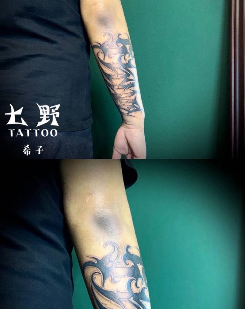 花体字设计纹身图片_手臂花体字纹身图案