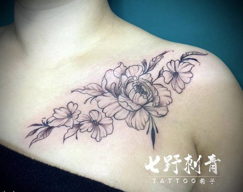 素花纹身图片_肩部纹身图案