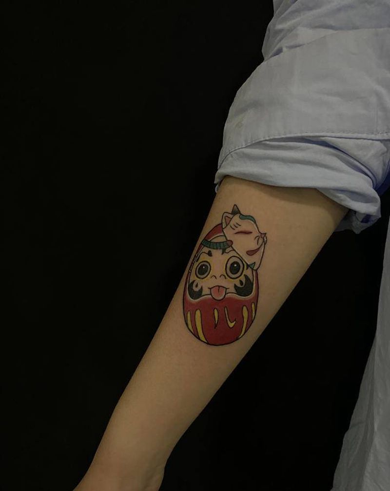 达摩蛋纹身图片_手臂老传统纹身图案