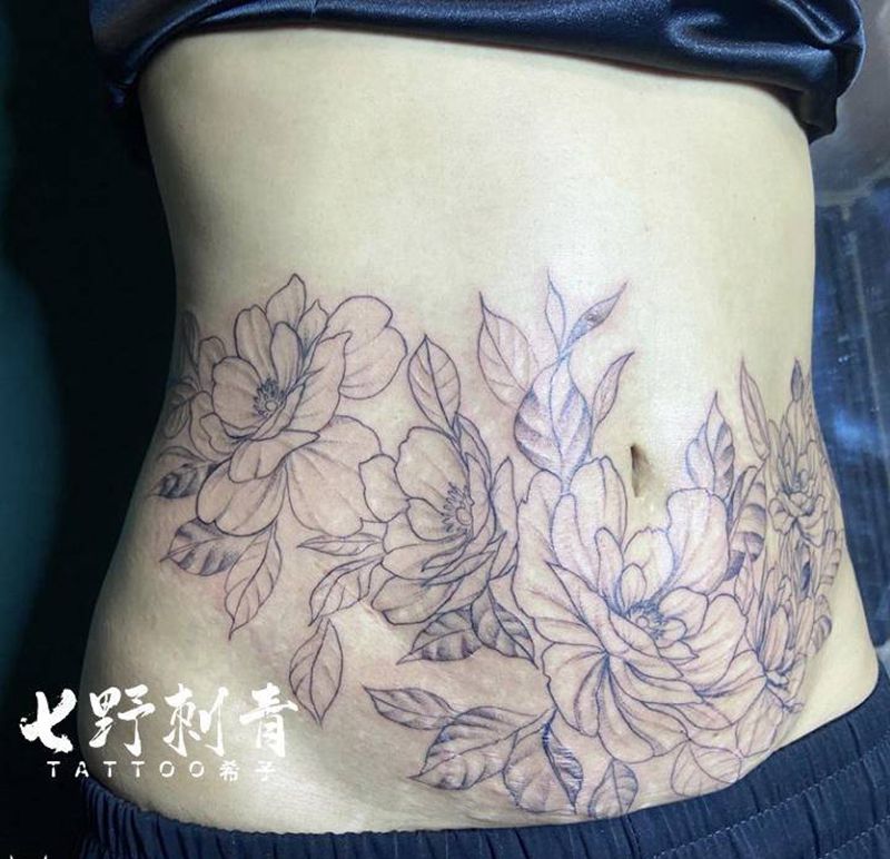 遮盖妊辰纹纹身图片_腹部纹身图案