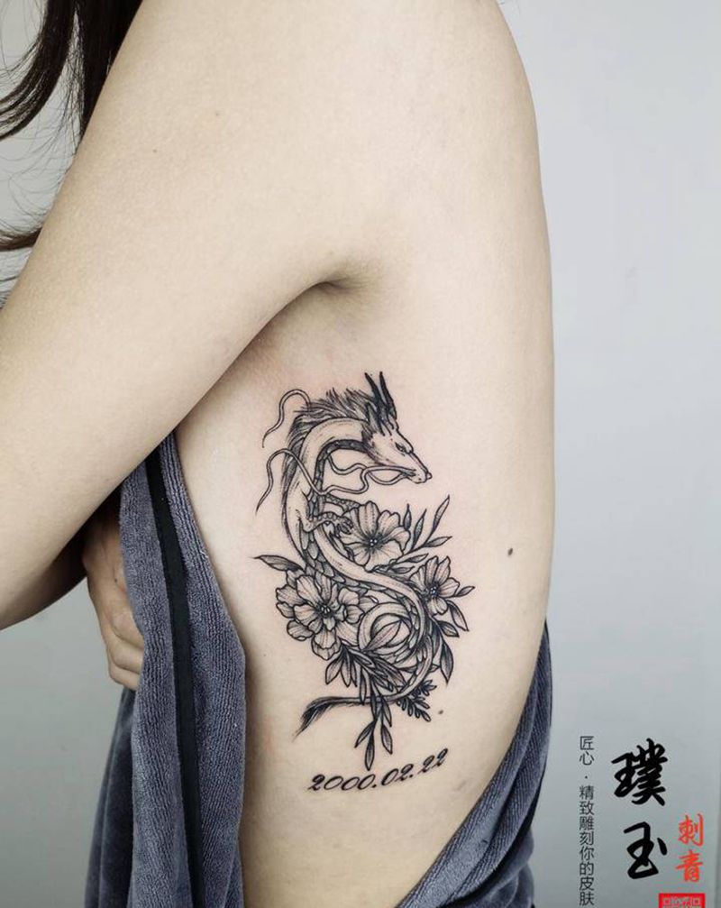 纪念属龙的弟弟纹身图片_腰部点刺龙花纹身图案