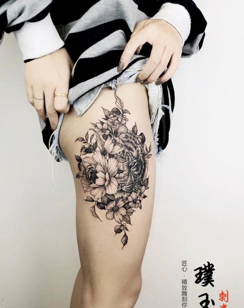 素花风格纹身图片_腿部点刺花虎纹身图案
