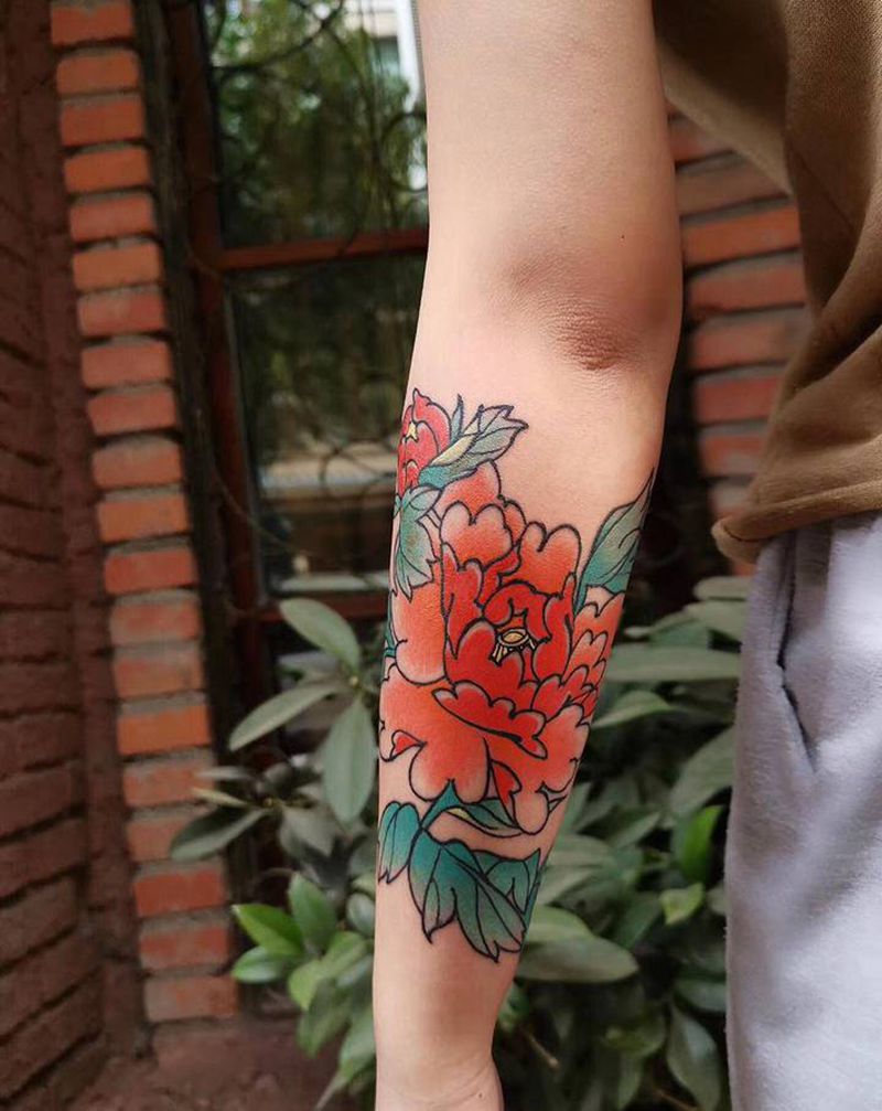 日式牡丹纹身图片_手臂老传统牡丹纹身图案