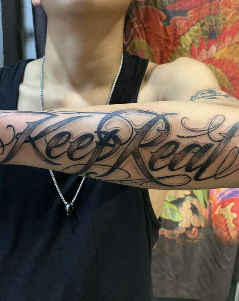 花体字纹身图片_手臂纹身图案