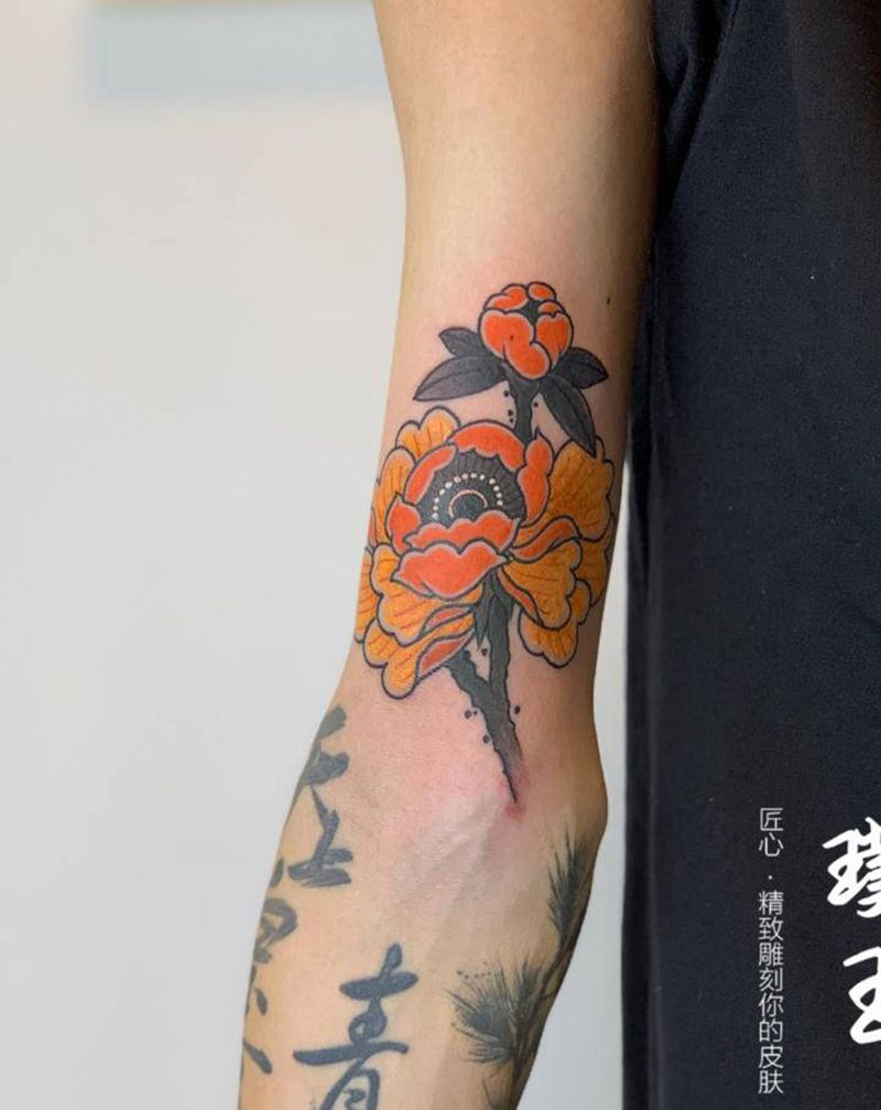 牡丹纹身图片_手臂老传统牡丹纹身图案
