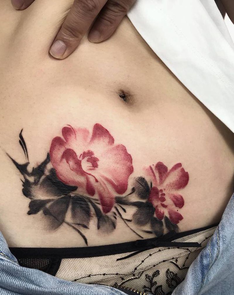 水墨石榴花纹身图片_腹部水墨纹身图案