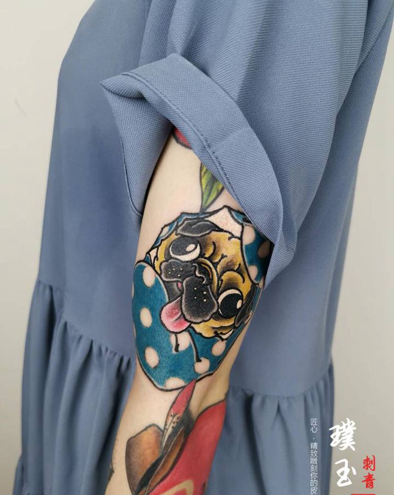 巴哥达摩蛋纹身图片_手臂老传统巴哥犬达摩蛋纹身图案