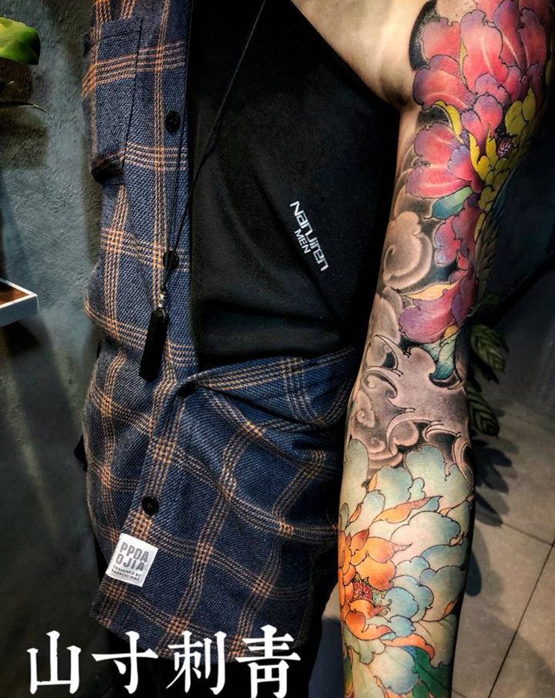 花臂纹身图片_手臂新传统纹身图案