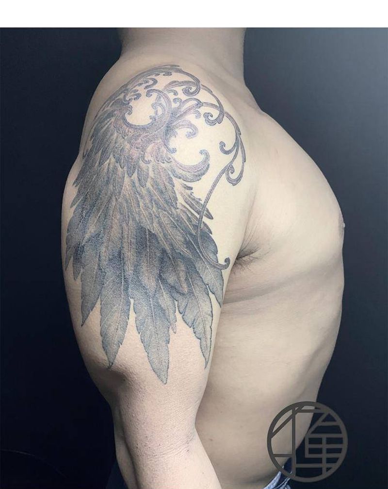 大臂浪花翅膀纹身图片_手部新传统纹身图案