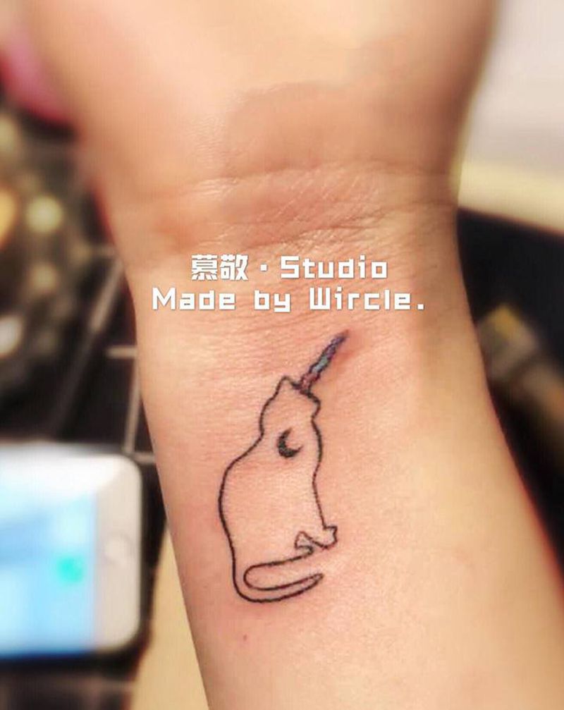 猫奴纹身图片_手臂纹身图案