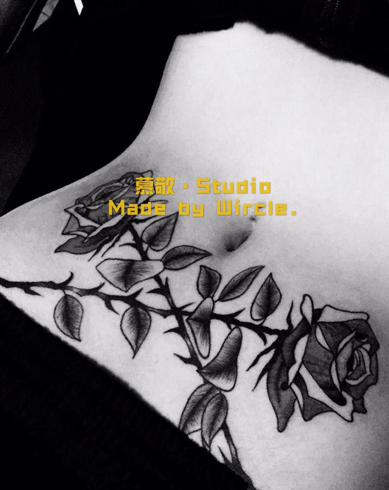 花花纹身图片_腹部纹身图案