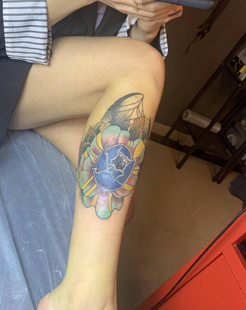 牡丹花遮盖纹身图片_腿部纹身图案