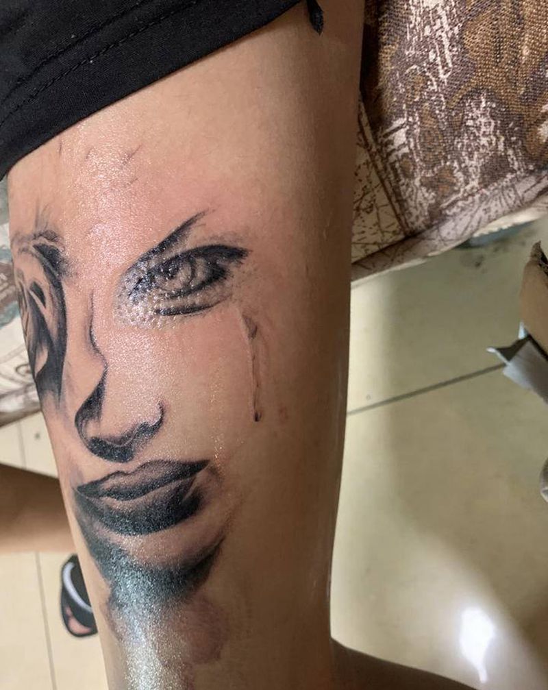 写实纹身图片_腿部欧美写实纹身图案