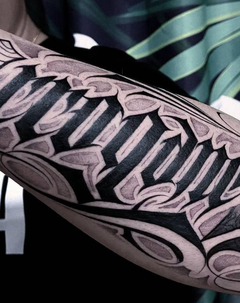 花体字纹身图片_手臂花体字纹身图案