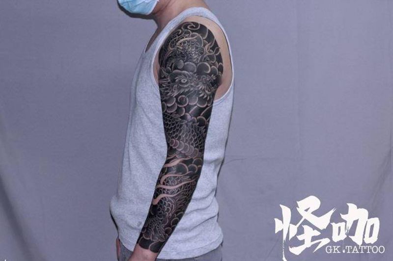 花臂纹身图片_手臂老传统纹身图案