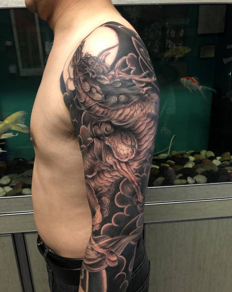 麒麟纹身图片_手臂老传统纹身图案