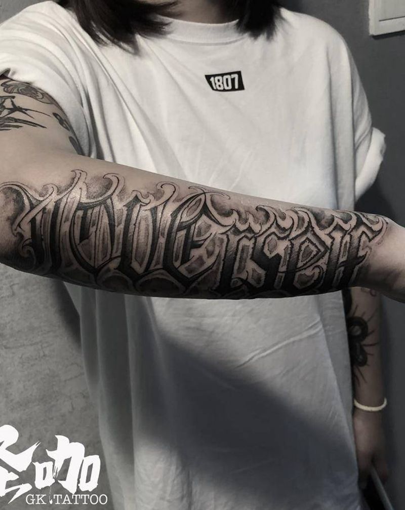 花体字纹身图片_手臂花体字纹身图案