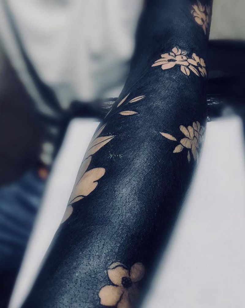 乌漆麻黑纹身图片_手臂纹身图案