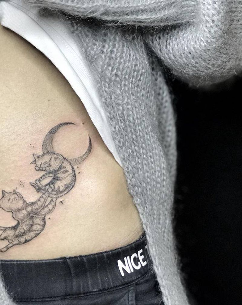 每一个生命都值得被爱纹身图片_腹部点刺猫月亮纹身图案