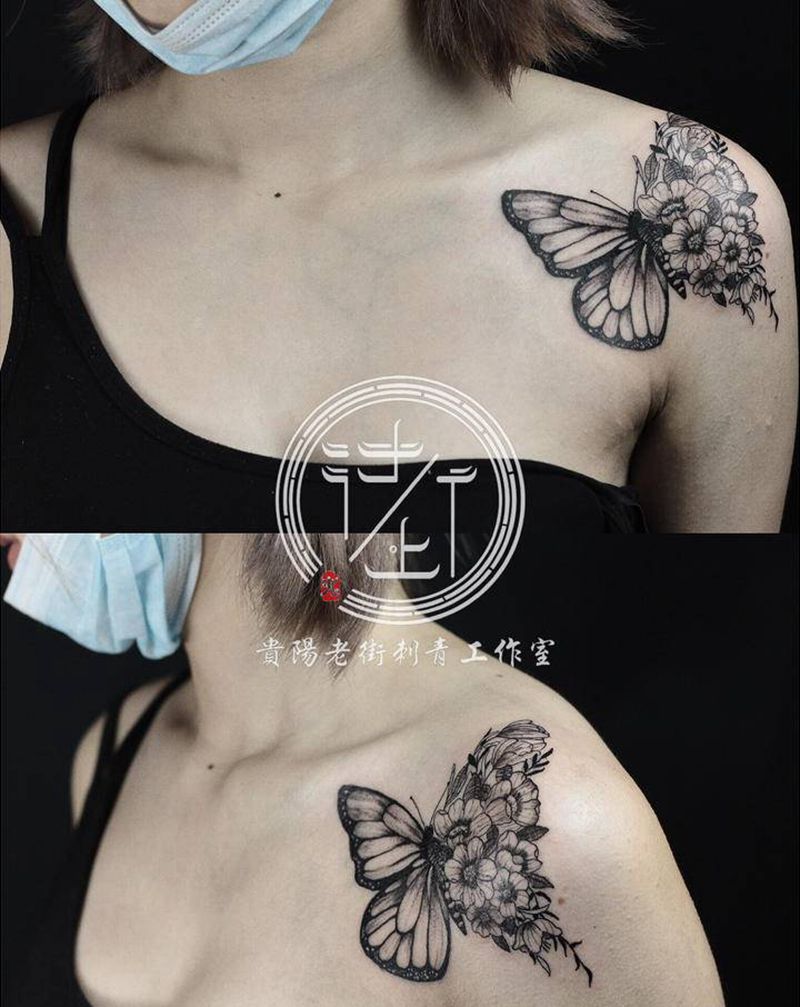 蝴蝶纹身图片_肩部点刺蝴蝶纹身图案