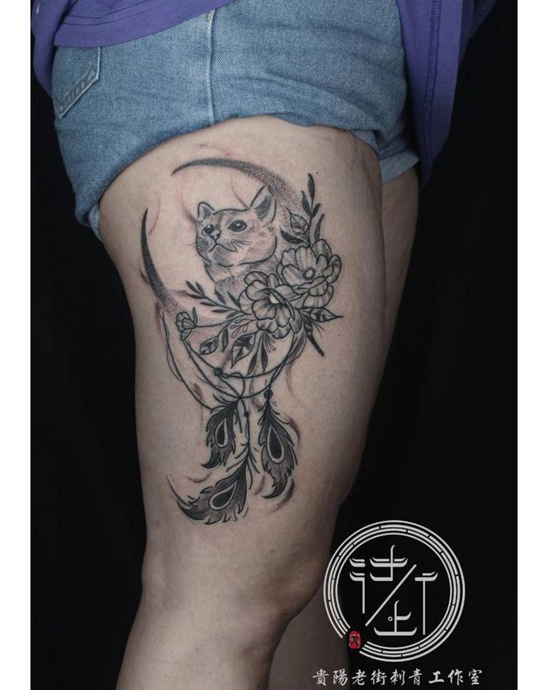 捕梦网纹身图片_腿部点刺图腾捕梦网猫纹身图案