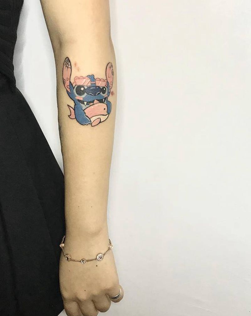 626纹身图片_手臂New School史迪仔纹身图案