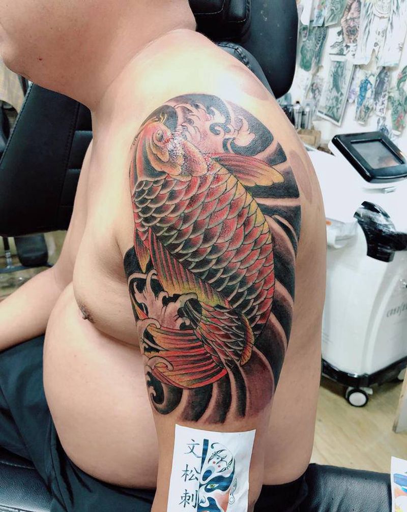 鱼纹身图片_手臂纹身图案