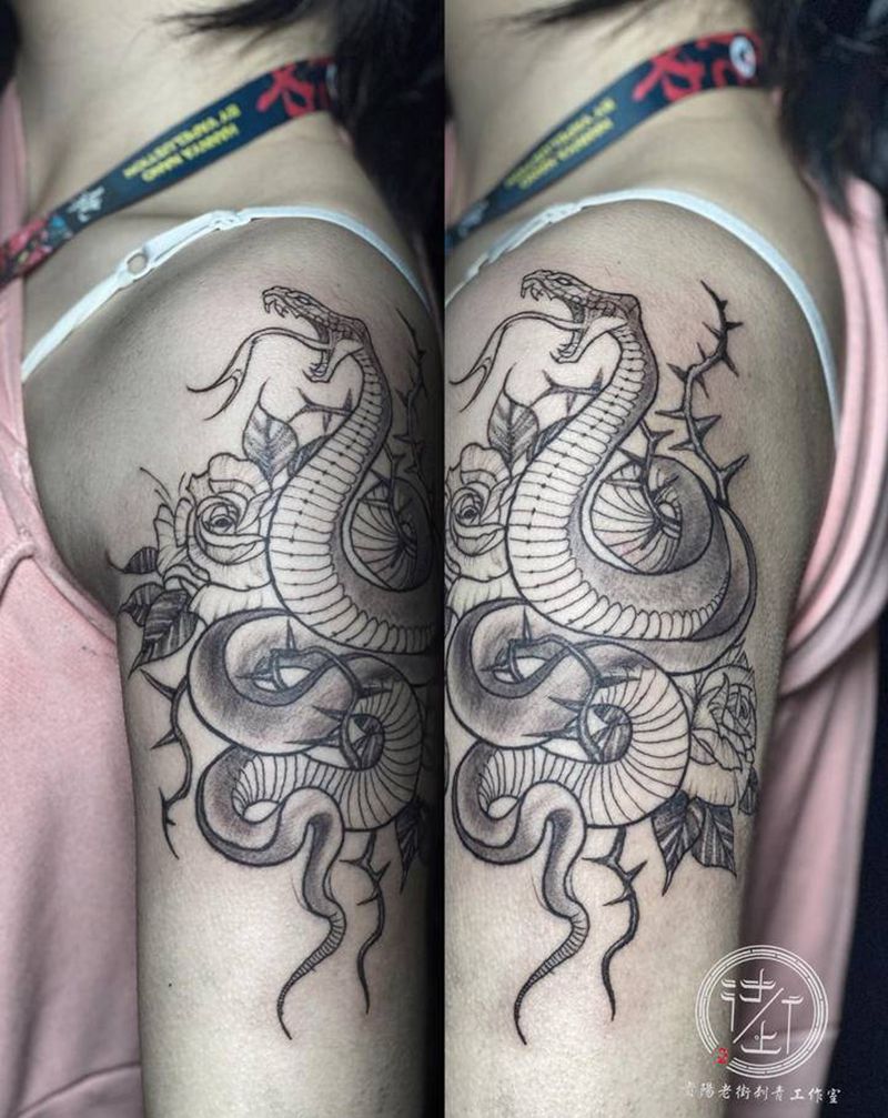 蛇纹身图片_手臂New School蛇纹身图案