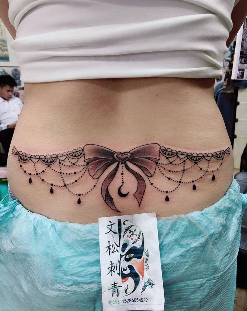 腰和环纹身图片_腰部手臂纹身图案