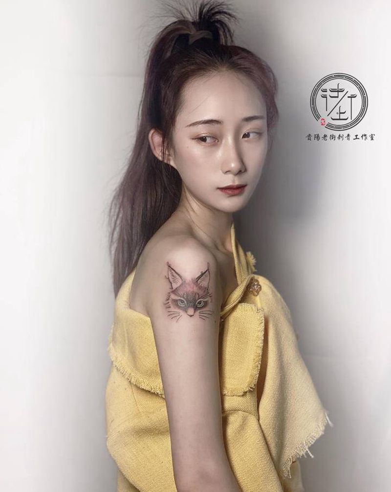 猫咪纹身图片_手臂点刺猫咪纹身图案