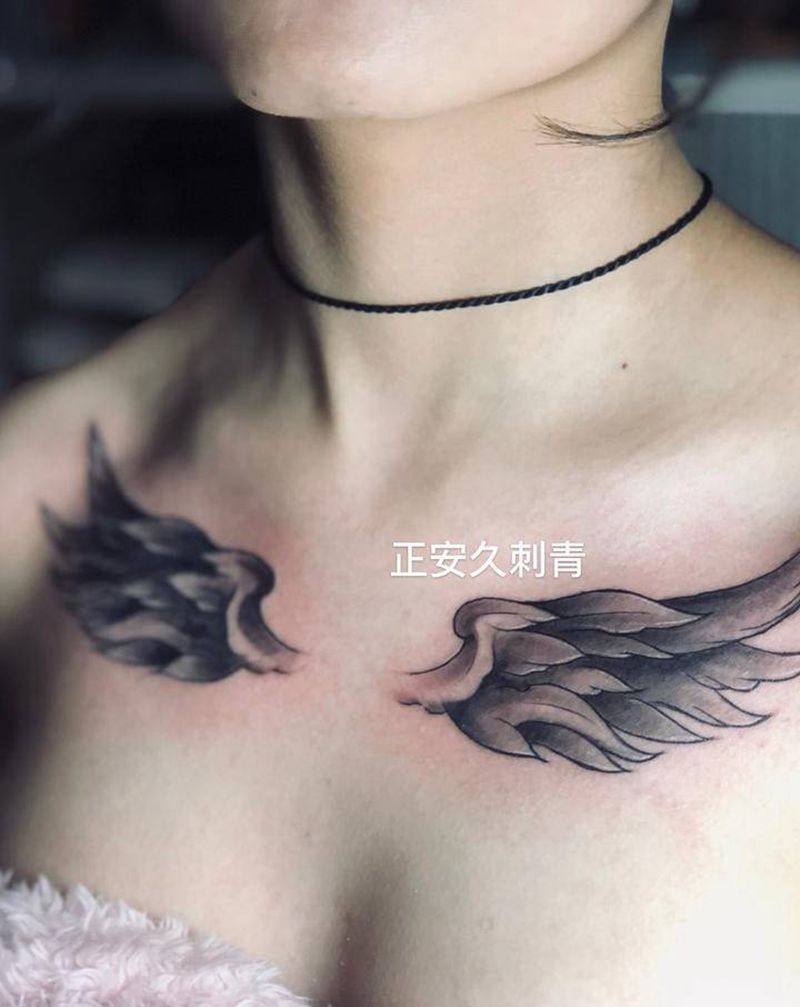 翅膀纹身图片_胸部纹身图案