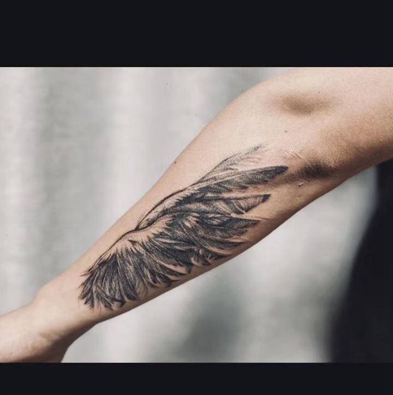 Jwei的小翅膀飞高高纹身图片_手臂点刺翅膀纹身图案